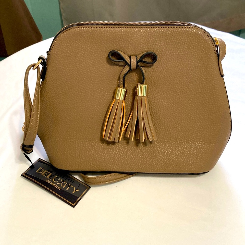 New ~ Vegan Leather Taupe Crossbody Tassel Purse adjustable straps.